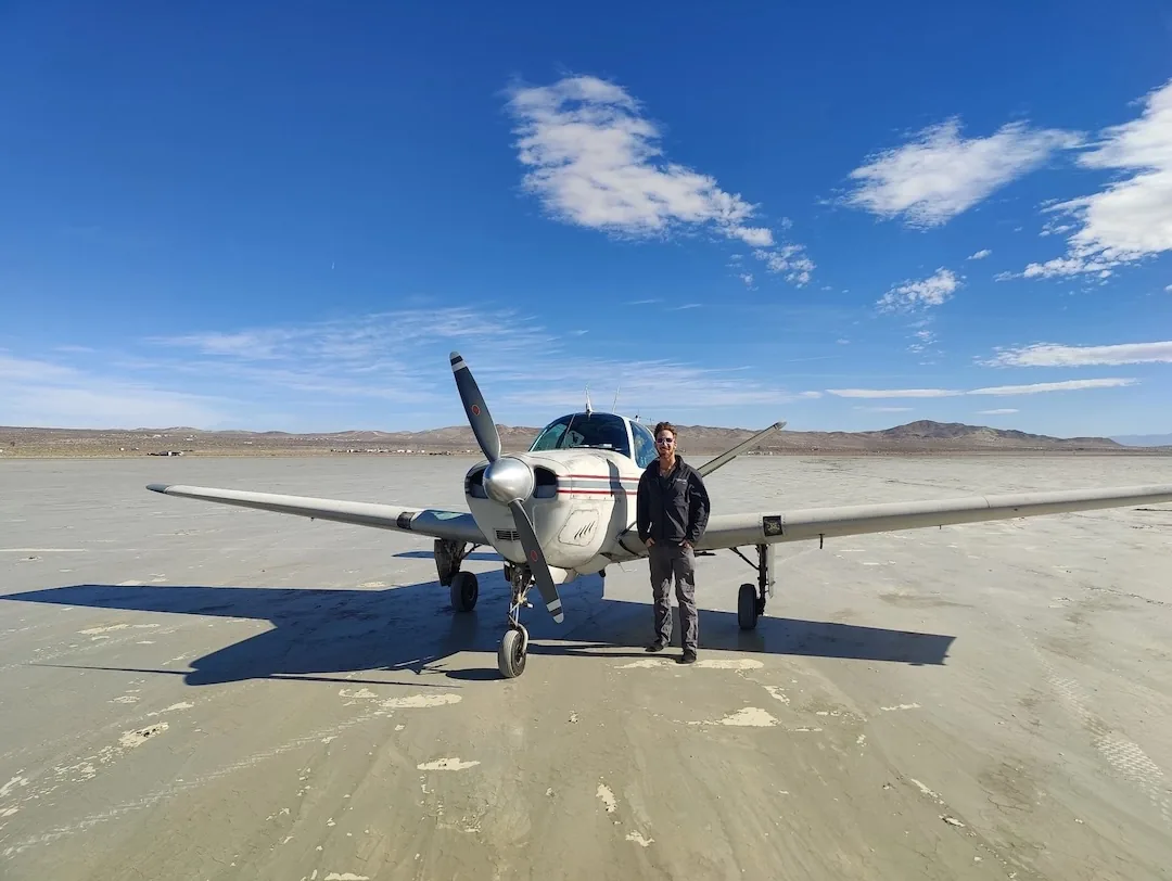 Training aircraft on a dry lake bed near Redlands during a high desert training flight