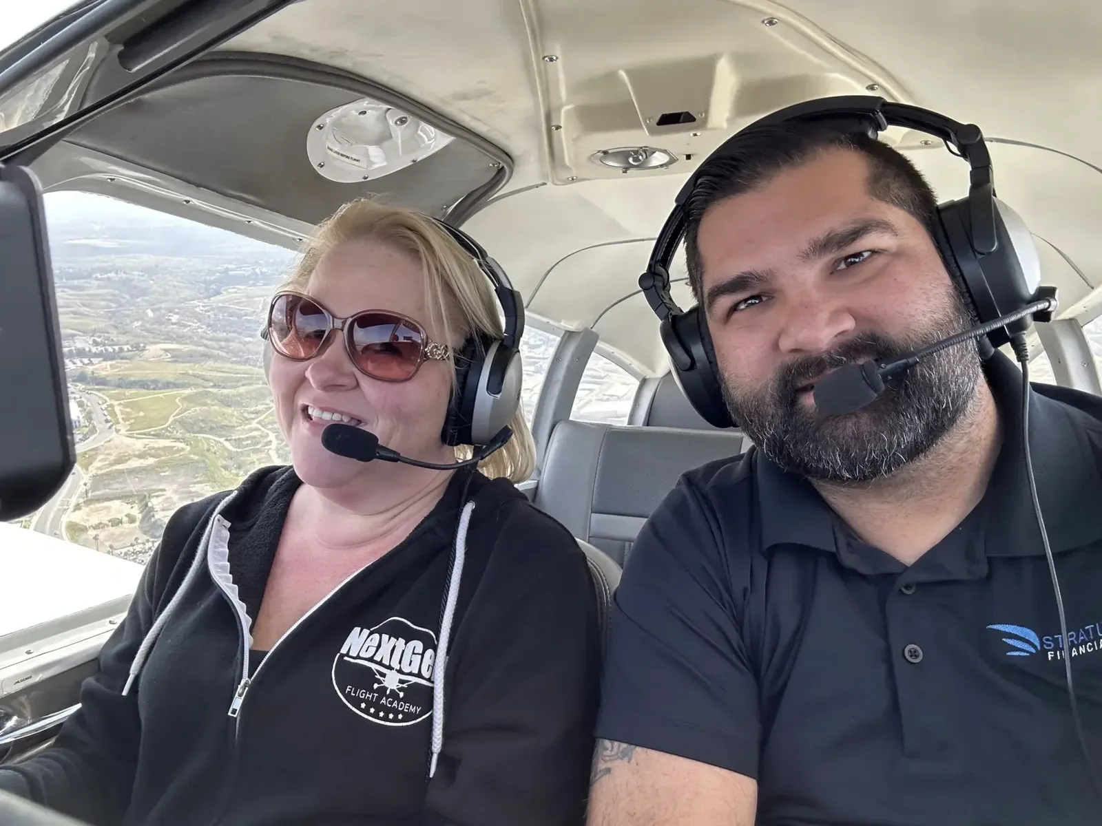 Training aircraft in flight over the Riverside Inland Empire during a cross-country lesson